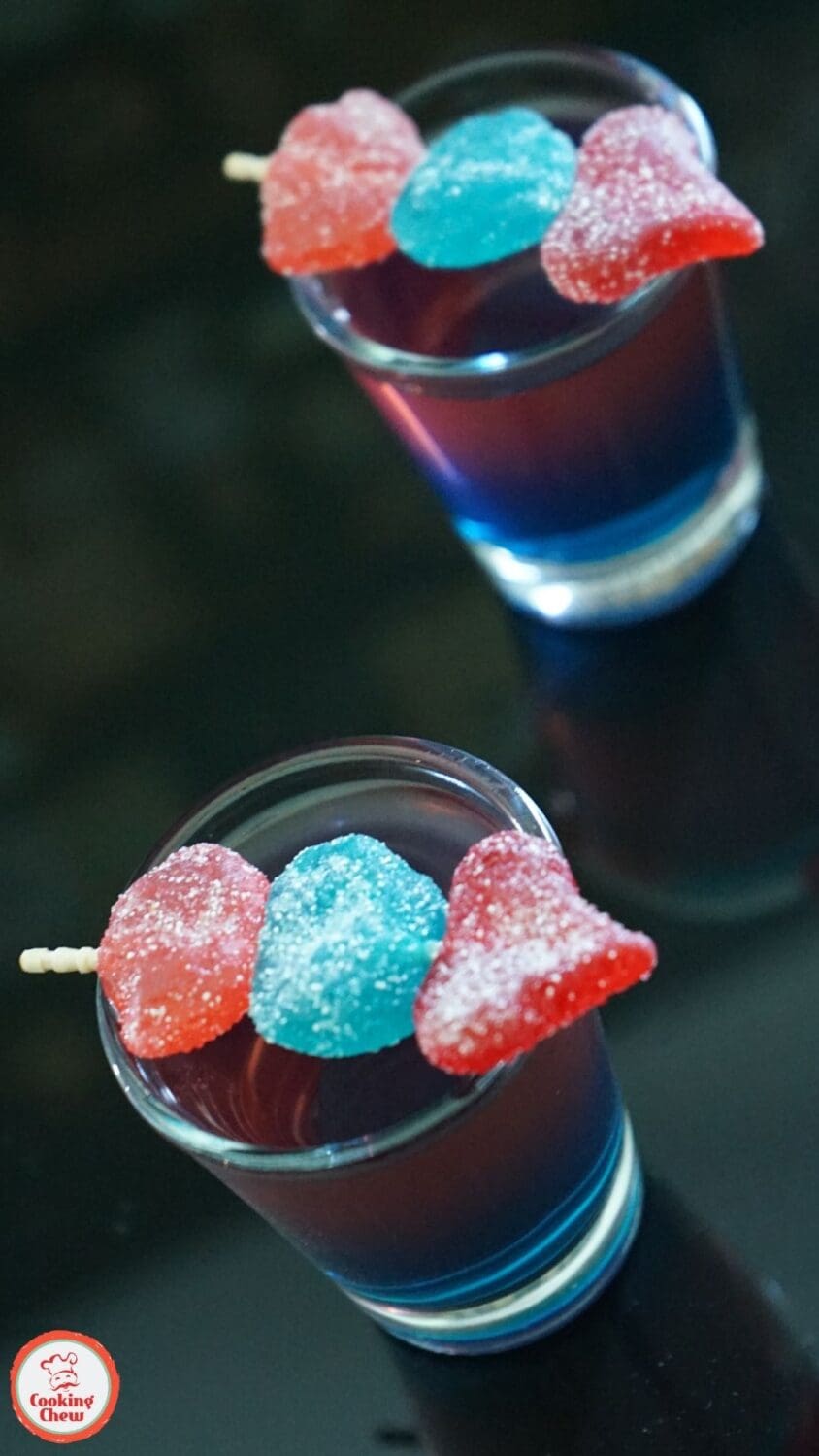 Close-up of bright, colorful layered Jolly Rancher shots with a fun, candy-inspired look.