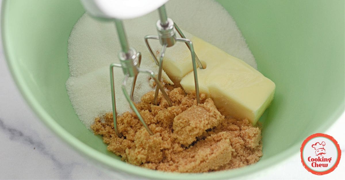A close-up of chewy peanut butter bars with a golden, slightly crisp edge.