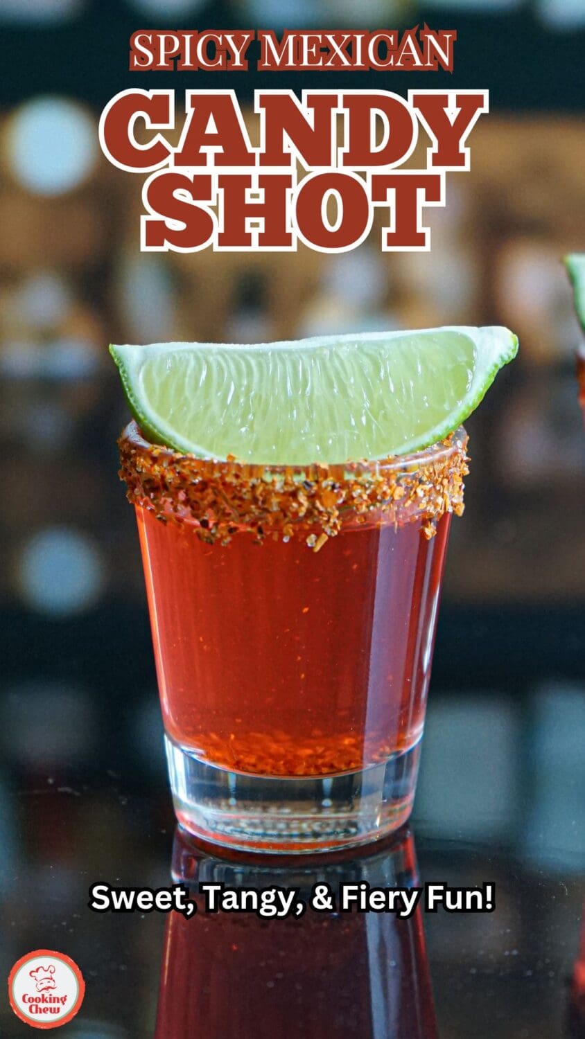 A vibrant red Mexican Candy Shot with a Taj&iacute;n-rimmed glass and a lime garnish.