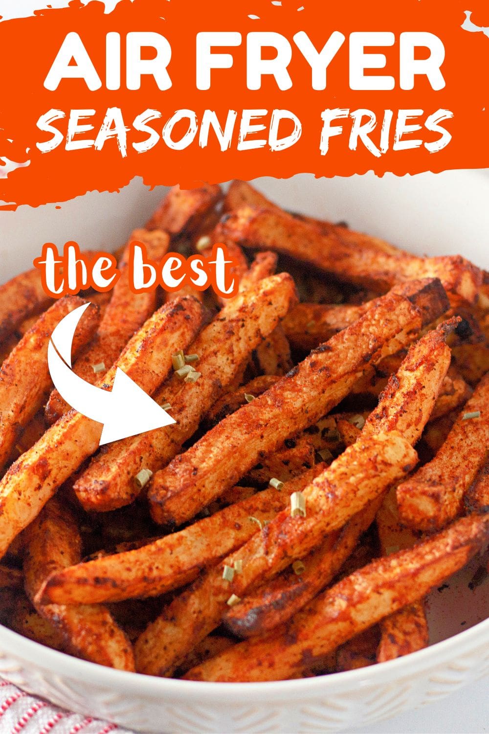 Golden and crispy seasoned fries made in an air fryer.​