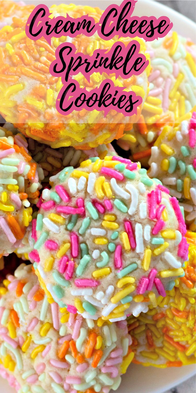 Sugar cookies with rainbow sprinkles, baked to golden perfection on a tray.