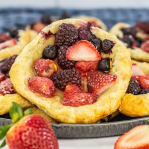 A clear, detailed image of an individual mixed berry pastry.
