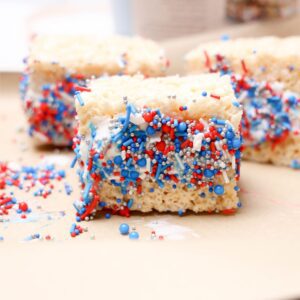 A clear image of a slice or individual portion of a homemade Rice Krispies ice cream sandwich.