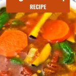 Healthy Moroccan soup served in white handled bowl on dark background.