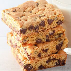 Stack of soft chocolate chip cookie bars made with cake mix.