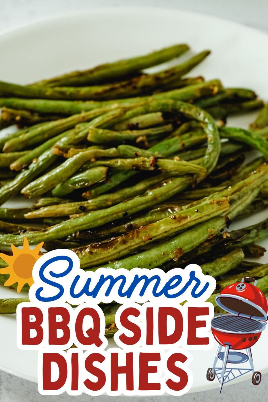 A pile of bright green, crispy air fryer green beans on a plate.