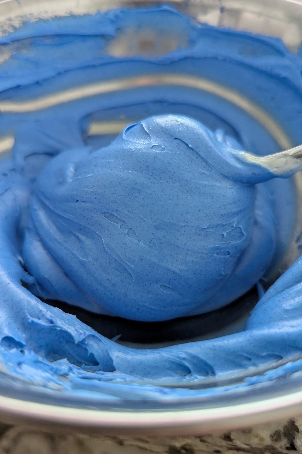 Smooth saturated blue chocolate coating ready for dipping or drizzling