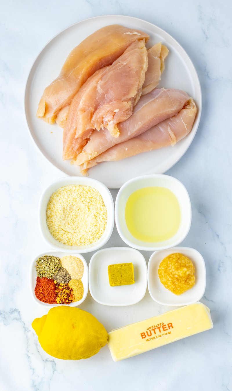 Ingredients for garlic parmesan chicken bake laid out on a counter